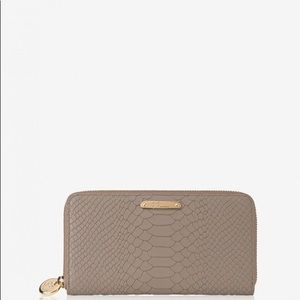 GiGi of NY large zip around wallet in stone python